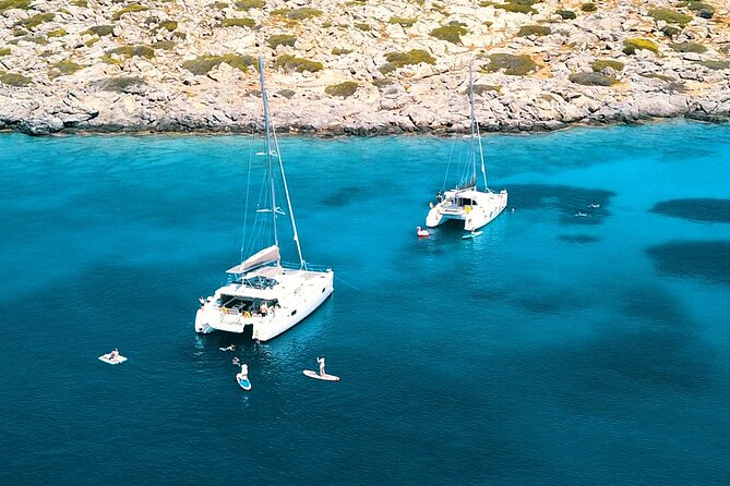 Heraklion: Catamaran Cruise to Dia with Sunset, Meal & Bar - Boarding at the Marina Café in Heraklion