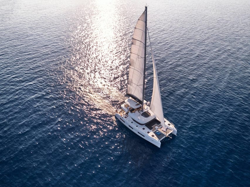 Heraklion: Dia Island Luxury Catamaran Cruise with Meal - What the crew adds to the day