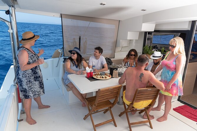Hersonissos: Luxury Sunset Catamaran Cruise Sushi & Open Bar - Sushi, Cretan drinks, and a light evening meal