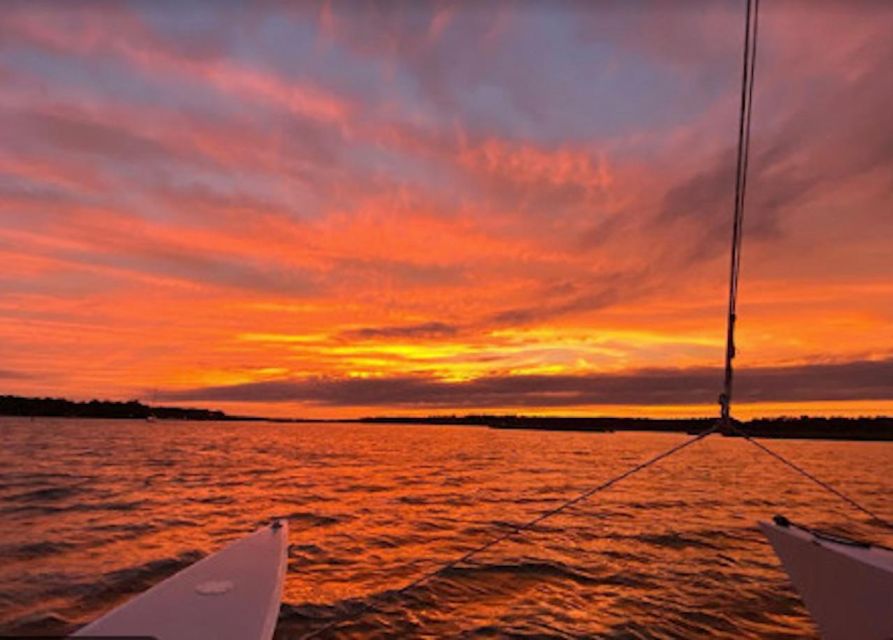 Hilton Head: Private Dolphin Day or Sunset Catamaran Sail - Sunset color and Shelter Cove fireworks