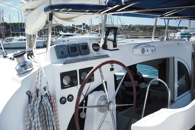 Ibiza & Formentera Private Catamaran Full-Day Sailing Tour - The return to Cala Jondal at sunset