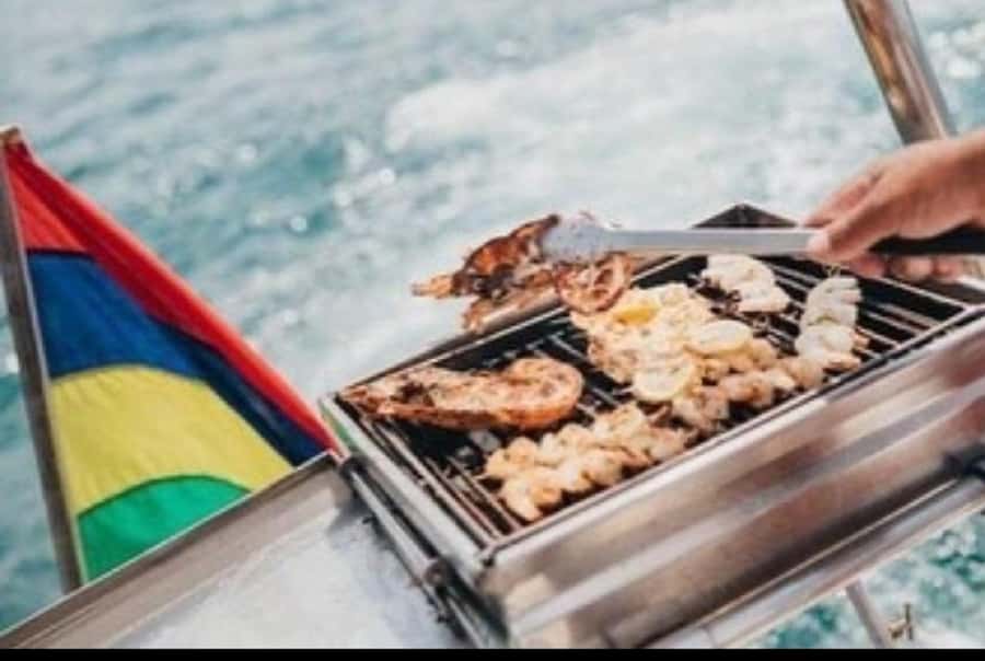 Ile Aux Cerfs Catamaran Cruise with Pick-up/Drop-off & Lunch - Swimming and snorkeling around Ile aux Cerfs
