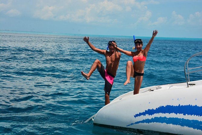 Isla Mujeres adventure by Catamaran. Snorkel, open bar and lunch - The beach club, buffet, and open national bar