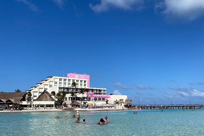 Isla Mujeres Basic Tour in Catamaran with Snorkel and Open Bar - A short swim at Playa Norte