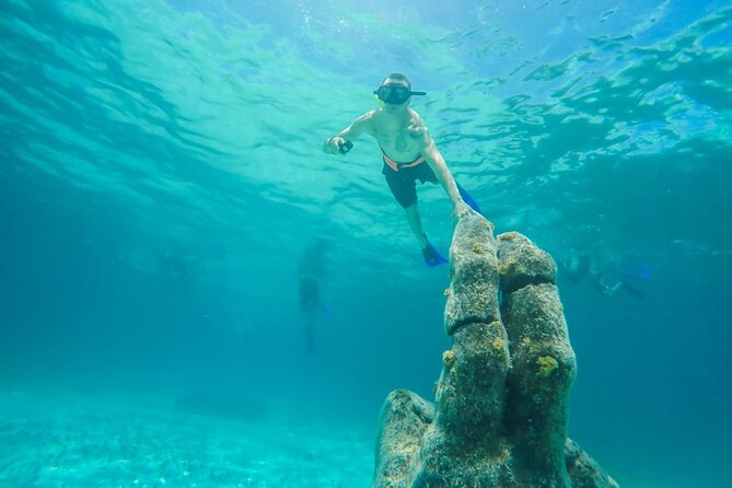 Isla Mujeres Catamaran Luxury Sailing Experience from Puerto Morelos - Calle Hidalgo and downtown Isla Mujeres