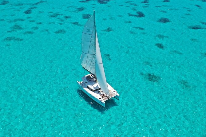 Isla Mujeres Catamaran Plus! Drinks, Snorkel & Beach Club - El Meco Reef and the 35-minute snorkel stop