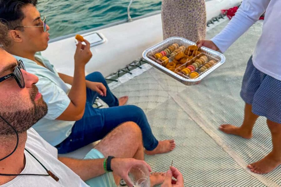 Isla Mujeres: Catamaran Ride with Open Bar, Snorkeling, and Lunch - Playa Norte and the beach-club break