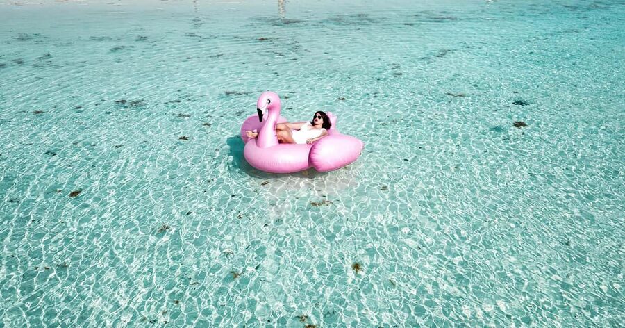 Isla Mujeres: Catamaran Ride with Open Bar, Snorkeling, and Lunch - The return sail and the full-day value