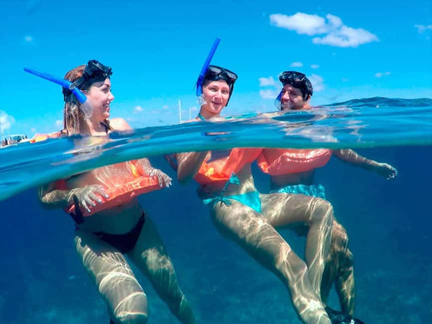 Isla Mujeres Catamaran Tour: Snorkel & Beach Adventure - Lunch, drinks, and the beach-club stop