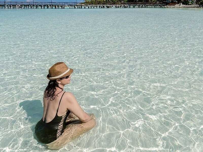 Isla Mujeres Catamaran Tour: Snorkel & Beach Adventure - The tequila party and the social atmosphere