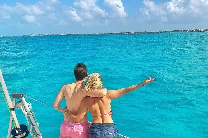 Isla Mujeres Catamaran Tour with Snorkel, Open bar and Transport - The return sail and the boat atmosphere
