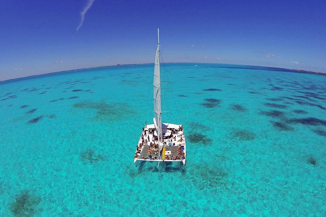 Isla Mujeres Catamaran Tour with Snorkeling at MUSA, Buffet Lunch & Open Bar - Leaving Cancun on a seven-hour sailing day