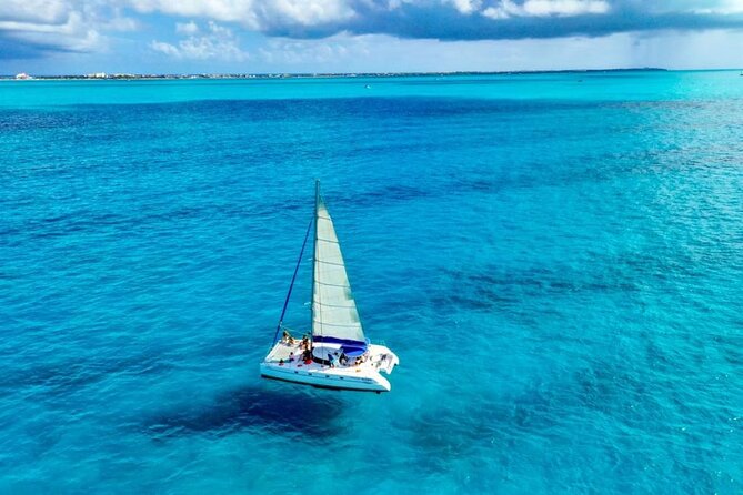 Isla Mujeres: Catamaran Tour with Snorkeling Food, Drinks, Beach - Exploring central Isla Mujeres for one hour