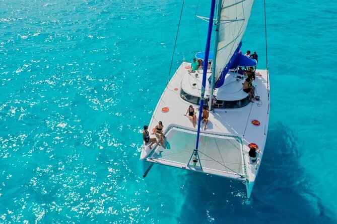 Isla Mujeres: Catamaran Tour with Snorkeling Food, Drinks, Beach - Buffet food and the beach club stop