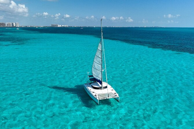 Isla Mujeres Catamaran Tour with Snorkeling, Open Bar & Buffet - Booking, cancellation, and practical details