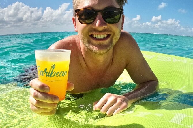 Isla Mujeres Catamaran Tour with Snorkeling, Open Bar & Buffet - Lunch and open bar at the Isla Mujeres beach club