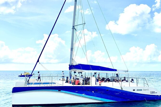 Isla Mujeres Catamaran Unlimited! Transportation from Playa del Carmen - Sailing toward Punta Sam Reef