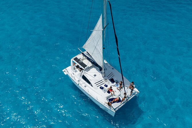 Isla Mujeres Day Tour with Catamaran, Snorkeling & Beach Club - A lively start at Marina Las Perlas