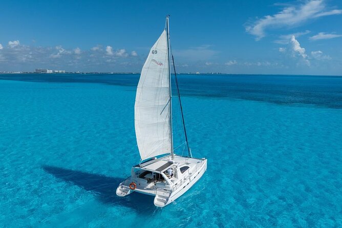 Isla Mujeres Day Tour with Catamaran, Snorkeling & Beach Club - Bahia Mujeres snorkeling: beautiful water, real conditions