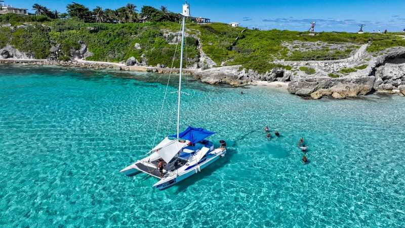 Isla Mujeres: Full Day Private Catamaran with Snorkeling - North Beach and the natural pool