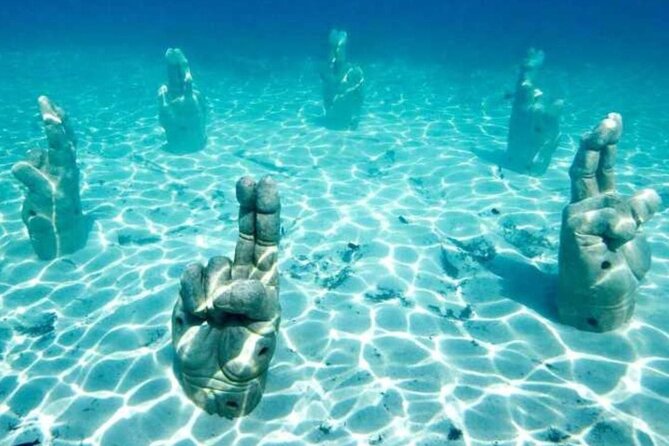 Isla Mujeres on luxury catamaran with snorkel, open bar and lunch - Five hours connected with Isla Mujeres