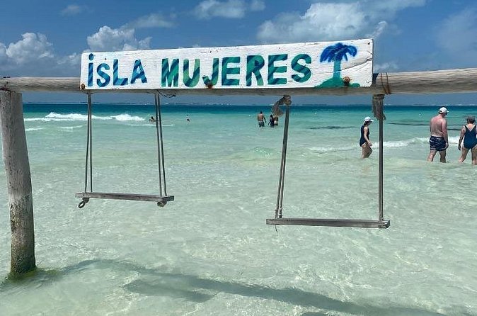 Isla Mujeres on luxury catamaran with snorkel, open bar and lunch - A return sail with music and an open bar