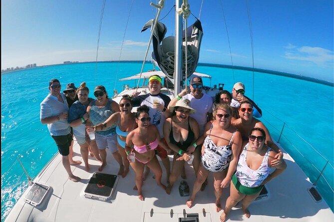 Isla Mujeres Premium Catamaran Tour with transportation from Playa del Carmen - Sailing toward Isla Mujeres