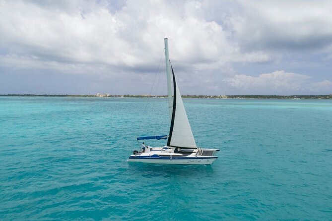 Isla Mujeres Premium Tour in Catamaran with Snorkel and Buffet - Sailing to El Meco Reef