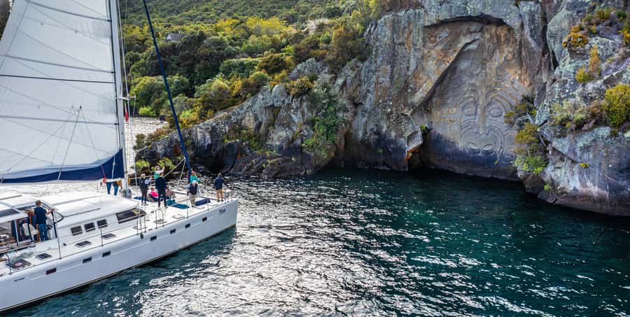 Lake Taupo: Luxury Sailing Catamaran to Māori Rock Carvings - The Swim Stop In Clear, Cold Water