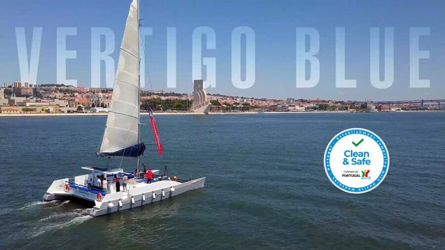 Lisbon: Private Catamaran Charter for up to 18-People - Turning Toward Lisbon and the 25th of April Bridge