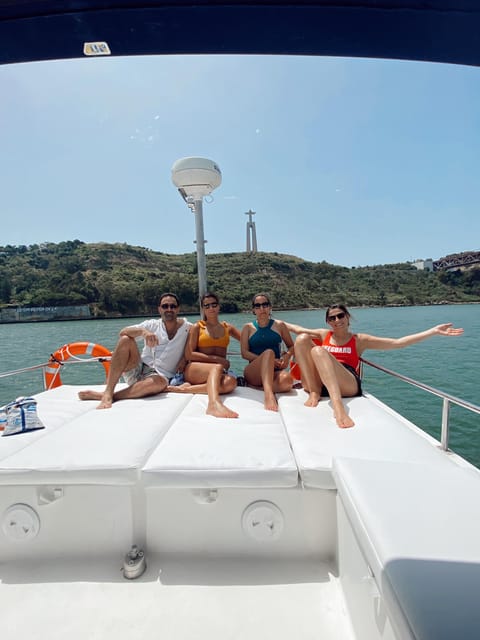 Lisbon: Private Luxury Catamaran Tour with Welcome Drink - The first views: Belém Tower and the Discoveries Monument