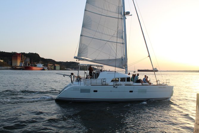 Lisbon Sailing Catamaran Public Cruise with drinks - Why a sunset sail works so well in Lisbon