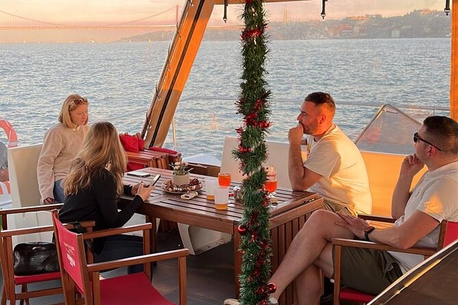 Lisbon: Sunset Catamaran Boat Tour with Music and Drinks - Belém Tower at Golden Hour