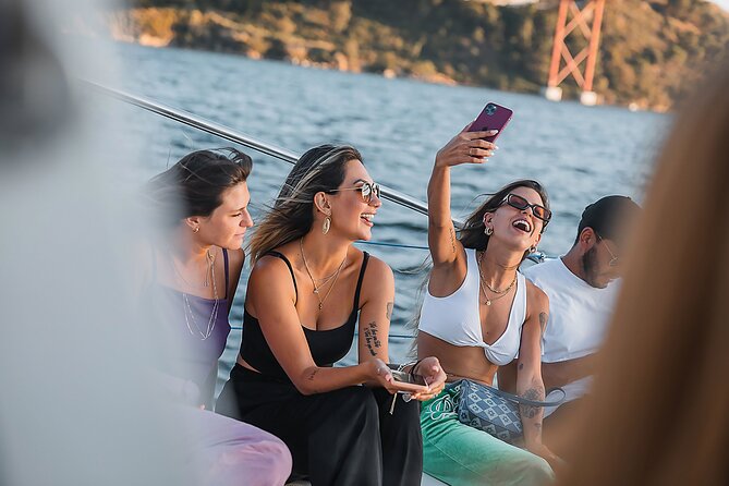 Lisbon: Sunset Catamaran Boat Tour with Music and Drinks - Nets, Covered Deck, and the Best Place to Sit