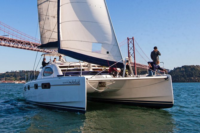Lisbon: Sunset Cruise With Drinks on Spacious Yacht - Space, seating, and the onboard mood