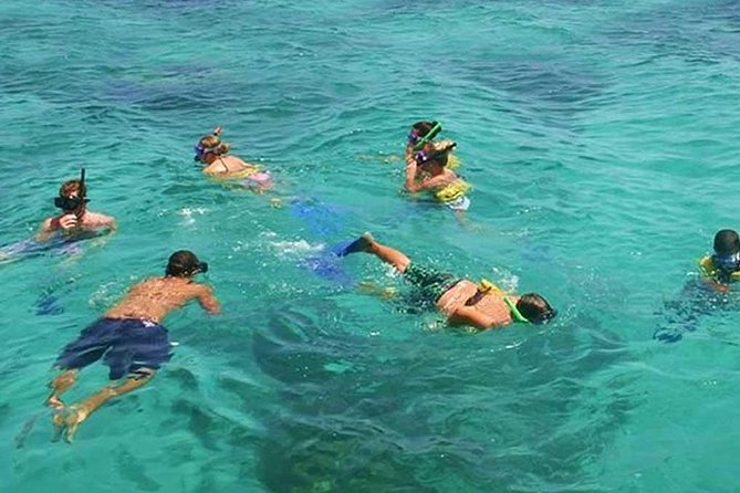 Live The Luxury Catamaran Isla Mujeres Tour in Cancun - Food, drinks, and the party atmosphere