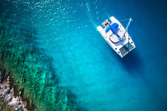 Live this unique experience. Catamaran to Isla Mujeres Tour. Open Bar included. - Key points to know before booking