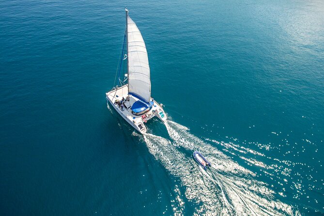 Live this unique experience. Catamaran to Isla Mujeres Tour. Open Bar included. - Exploring downtown Isla Mujeres