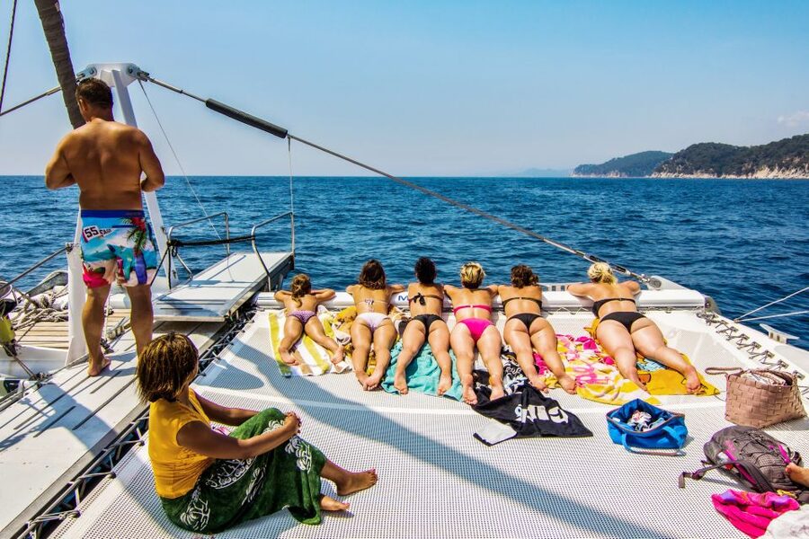 Lloret de Mar: Catamaran Sailing Cruise with BBQ and Drinks - The crew and safety setup