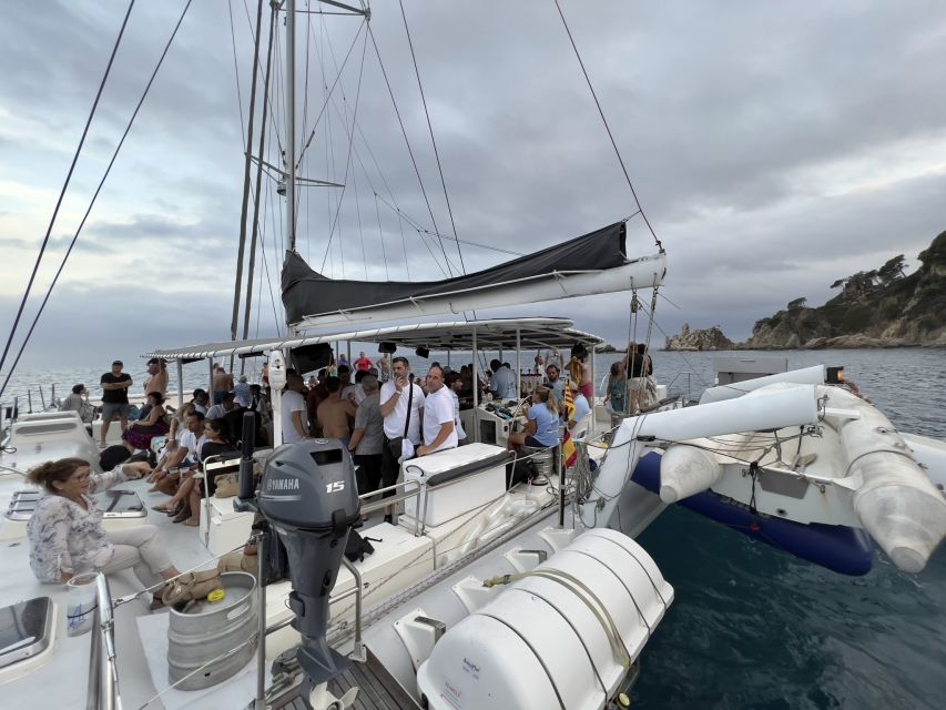 Lloret de Mar: Sunset Catamaran Cruise with DJ and Drinks - A practical evening plan