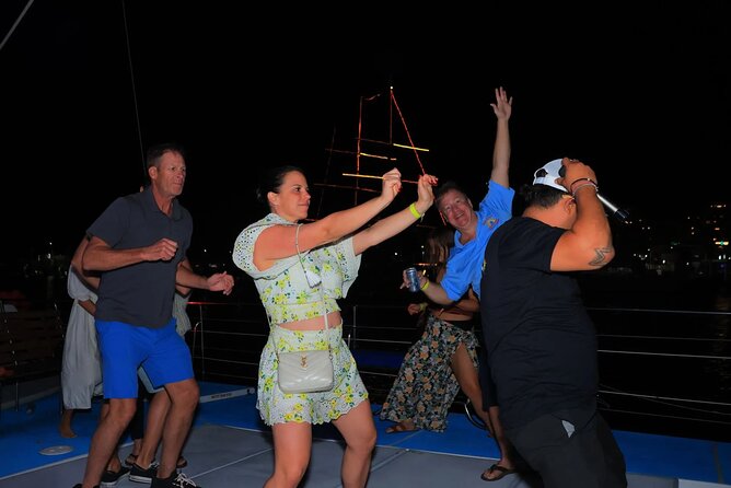 Los Cabos Catamaran Cruise with Open Bar & Light Snack - Music, dancing, and the adult atmosphere