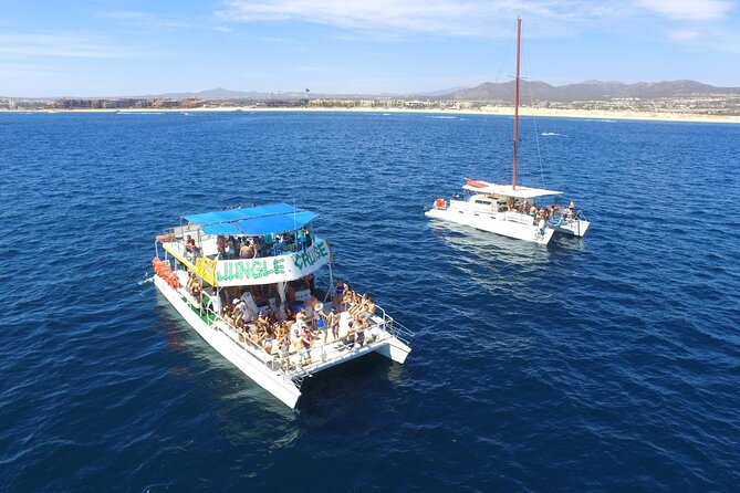 Los Cabos Catamaran: Iconic Sunset Cruise with Drinks & DJ - The Lily Pad mat and time in the water