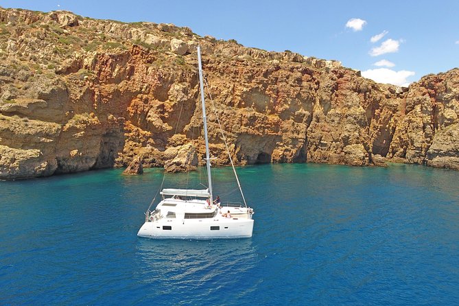 Luxury Catamaran Cruise from Athens with Traditional Greek Meal and BBQ - The second stop, snorkeling gear, and clear water