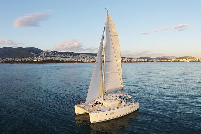 Luxury Catamaran Cruise from Athens with Traditional Greek Meal and BBQ - Sunset sailing or morning lunch cruise