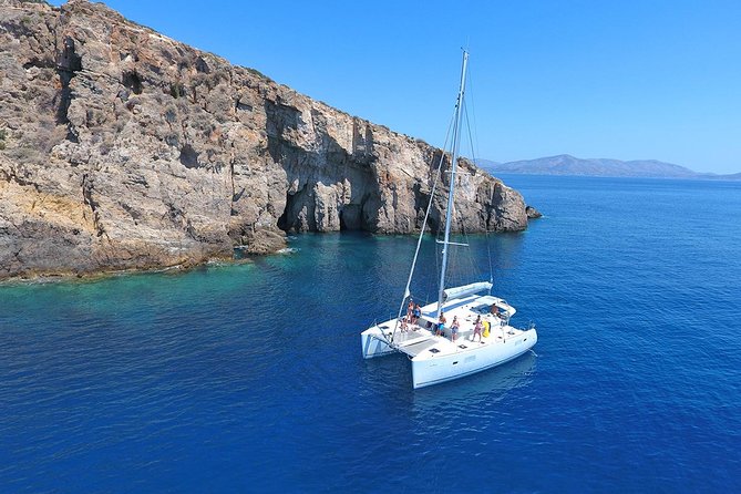 Luxury Catamaran Cruise Including pickup and Traditional Food - A Greek lunch served beside the sea