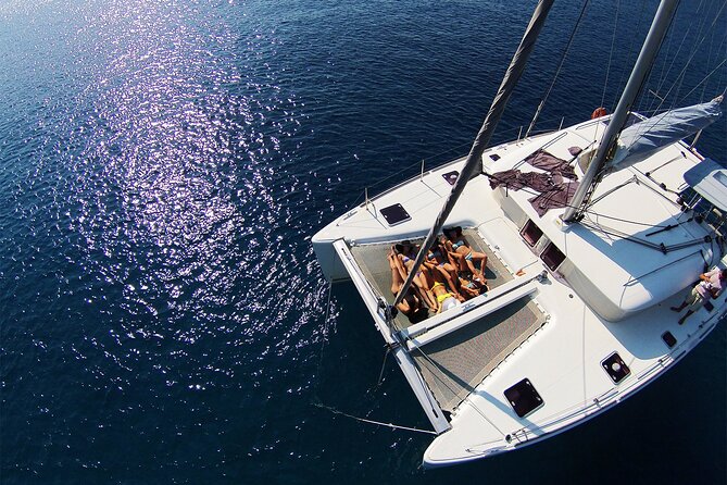 Luxury Catamaran Cruise Including pickup and Traditional Food - Who will get the most value from this cruise?