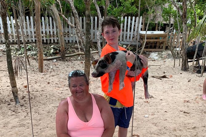 Luxury Catamaran Cruise: Sip, Sail, Snorkel, and Swim with Pigs! - What the crew adds to the day
