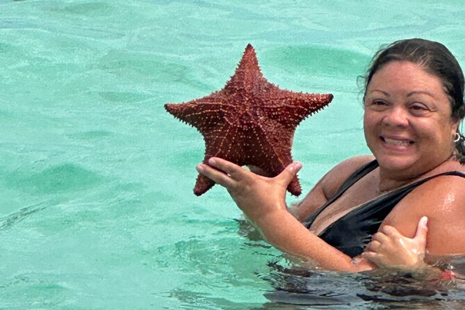 Luxury Catamaran Cruise: Sip, Sail, Snorkel, and Swim with Pigs! - First stop: reef snorkeling near Pearl Island