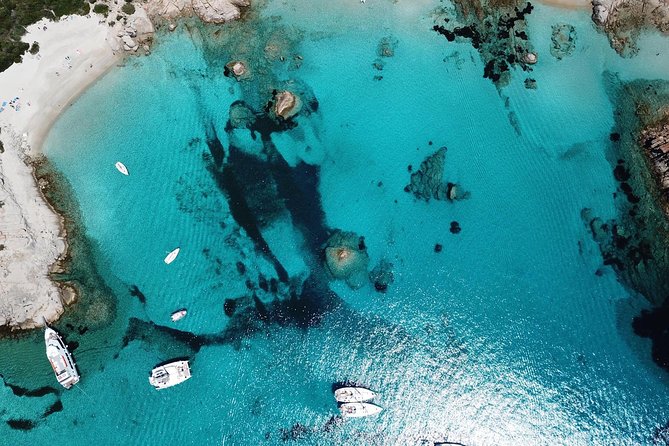 Luxury catamaran from Porto Rafael-Palau to the Maddalena Archipelago - Razzoli and Santa Maria: cliffs, a lighthouse, and calm coves