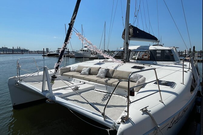 Luxury Catamaran Private Tour Baltimore Harbor - The National Aquarium after dark